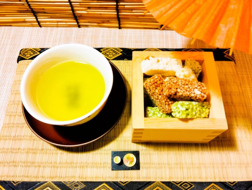 Traditional Tokyo snack Kaminari Okoshi with green tea