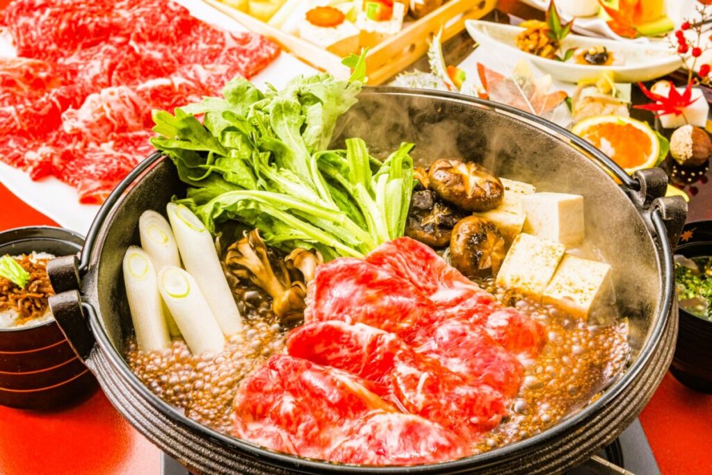 Japanese sukiyaki hot pot with beef and vegetables