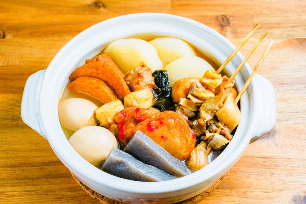 Traditional Japanese oden with simmered radish, egg, and fish cakes
