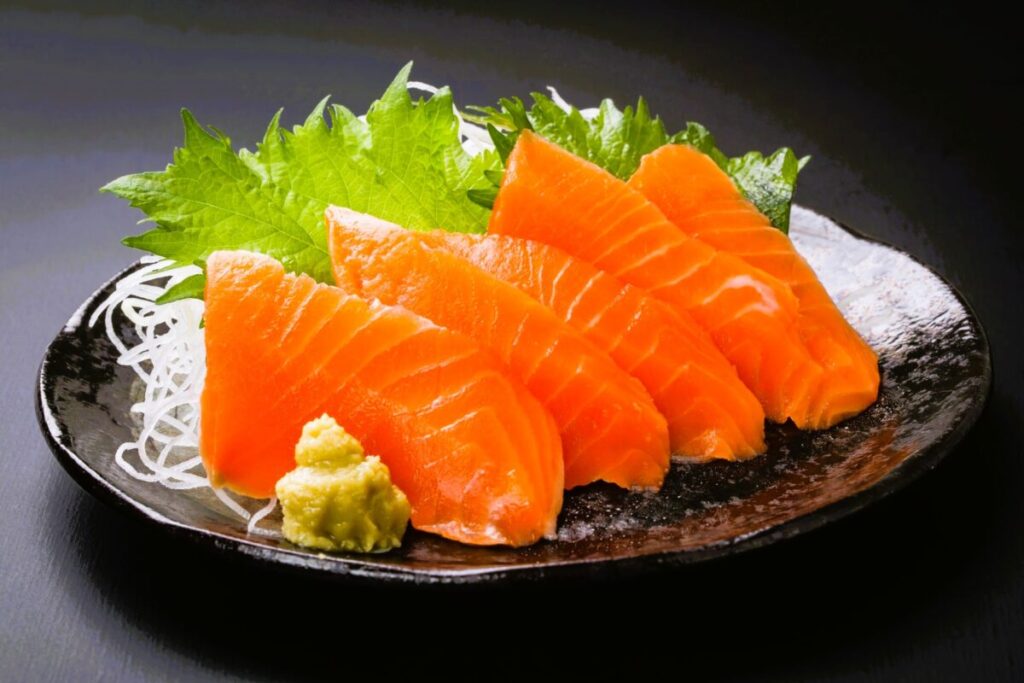 Fresh salmon sashimi on plate