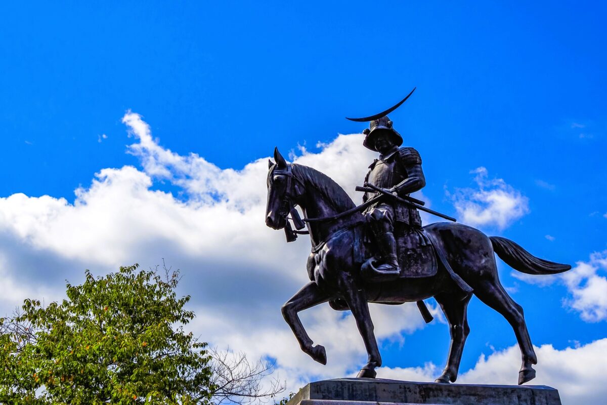 Statue of Date Masamune on horseback at Sendai Castle site in Japan