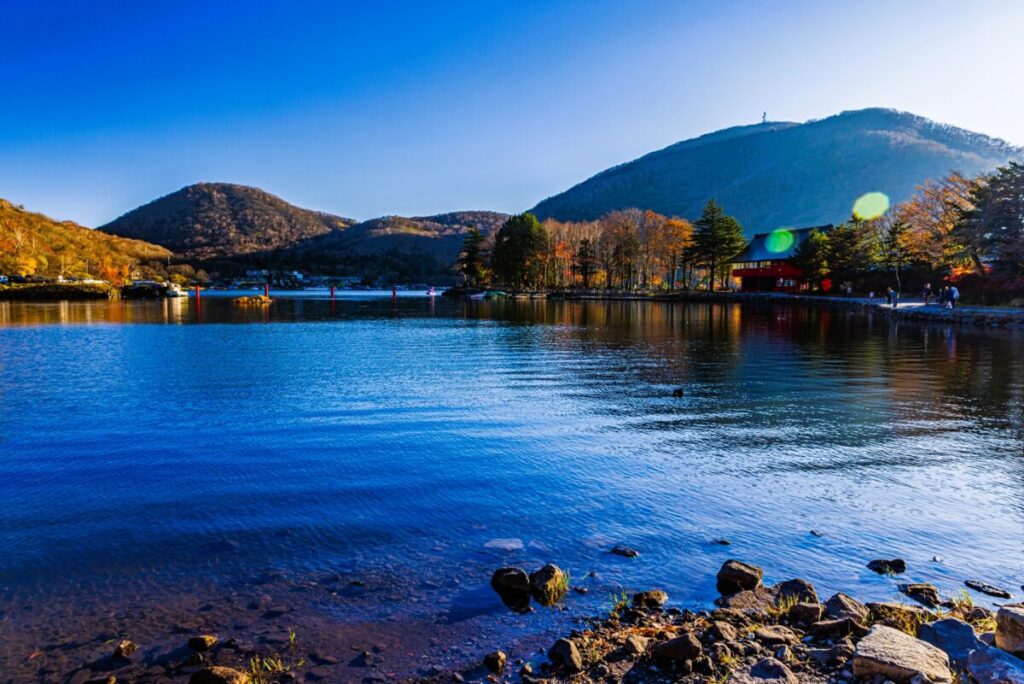 Lake Onuma in Gunma surrounded by calm water and natural mountain scenery
