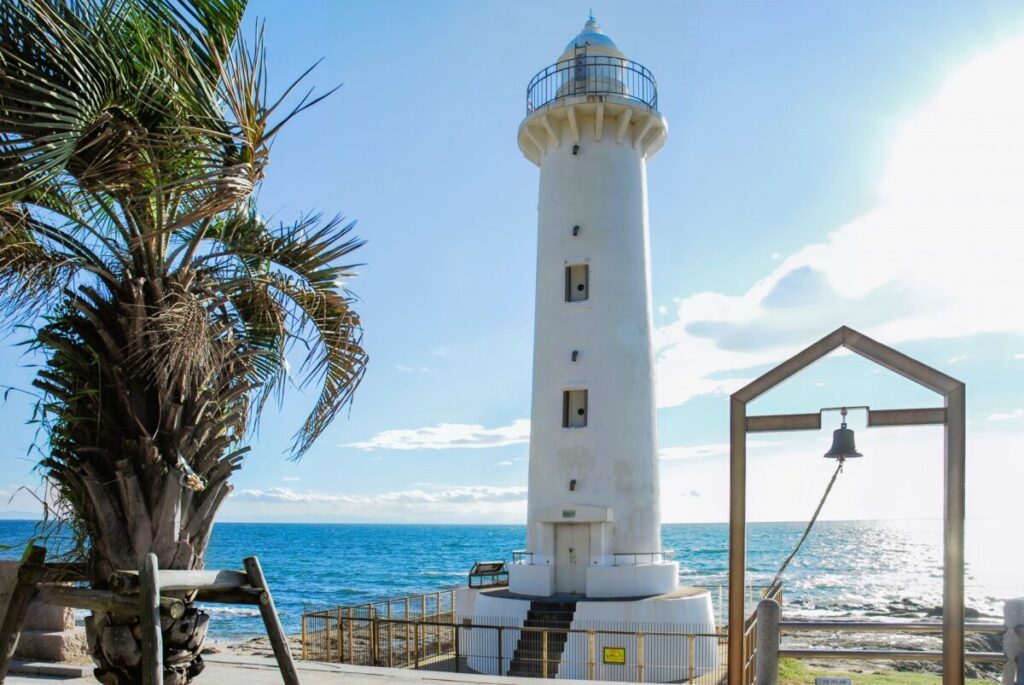 Noma Misaki Lighthouse with Love Bell monument in Aichi