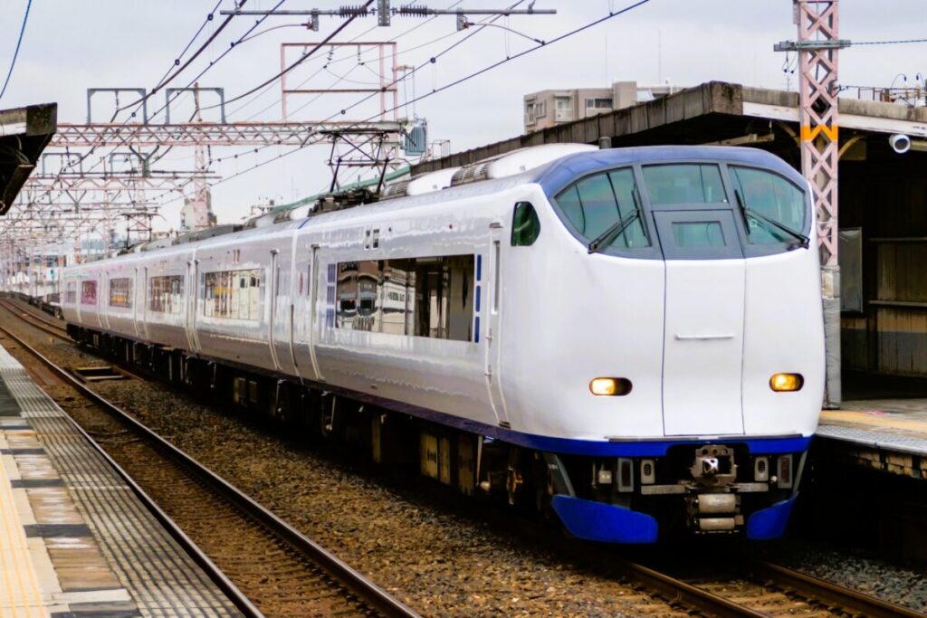 Kansai Airport Express Haruka Train Traveling Through Osaka