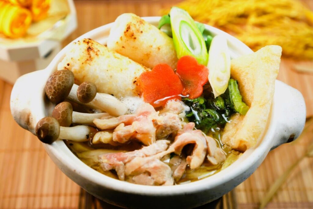 Traditional Akita-style kiritanpo served with miso or hot pot ingredients