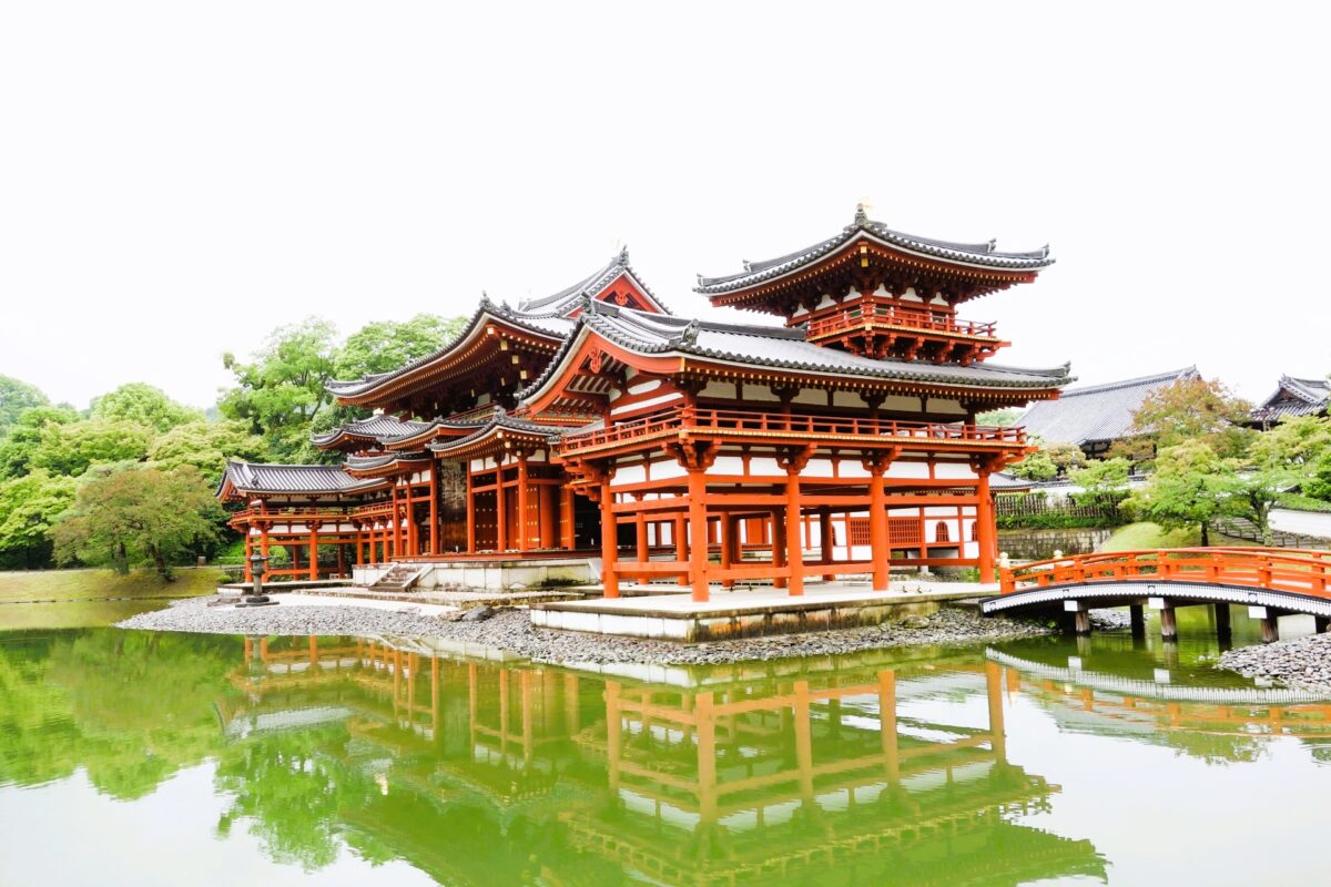 Phoenix Hall of Byodo-in Temple in Uji, Kyoto, reflected on the pond