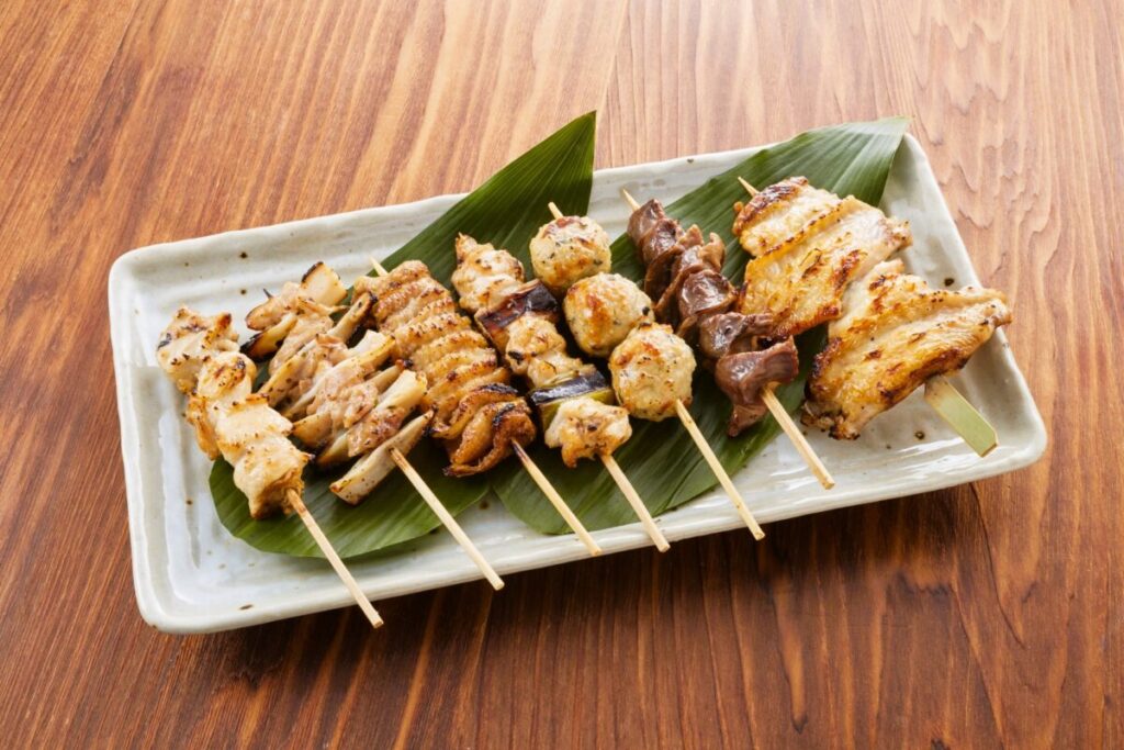 Japanese yakitori grilled chicken skewers served fresh