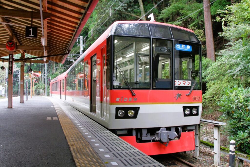 Eizan Railway train running through scenic areas of Kyoto