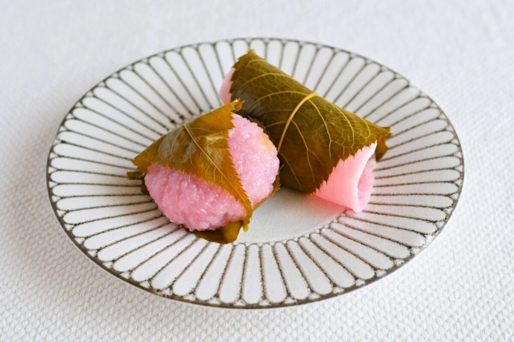 Japanese sakuramochi rice cake wrapped in a salted cherry leaf