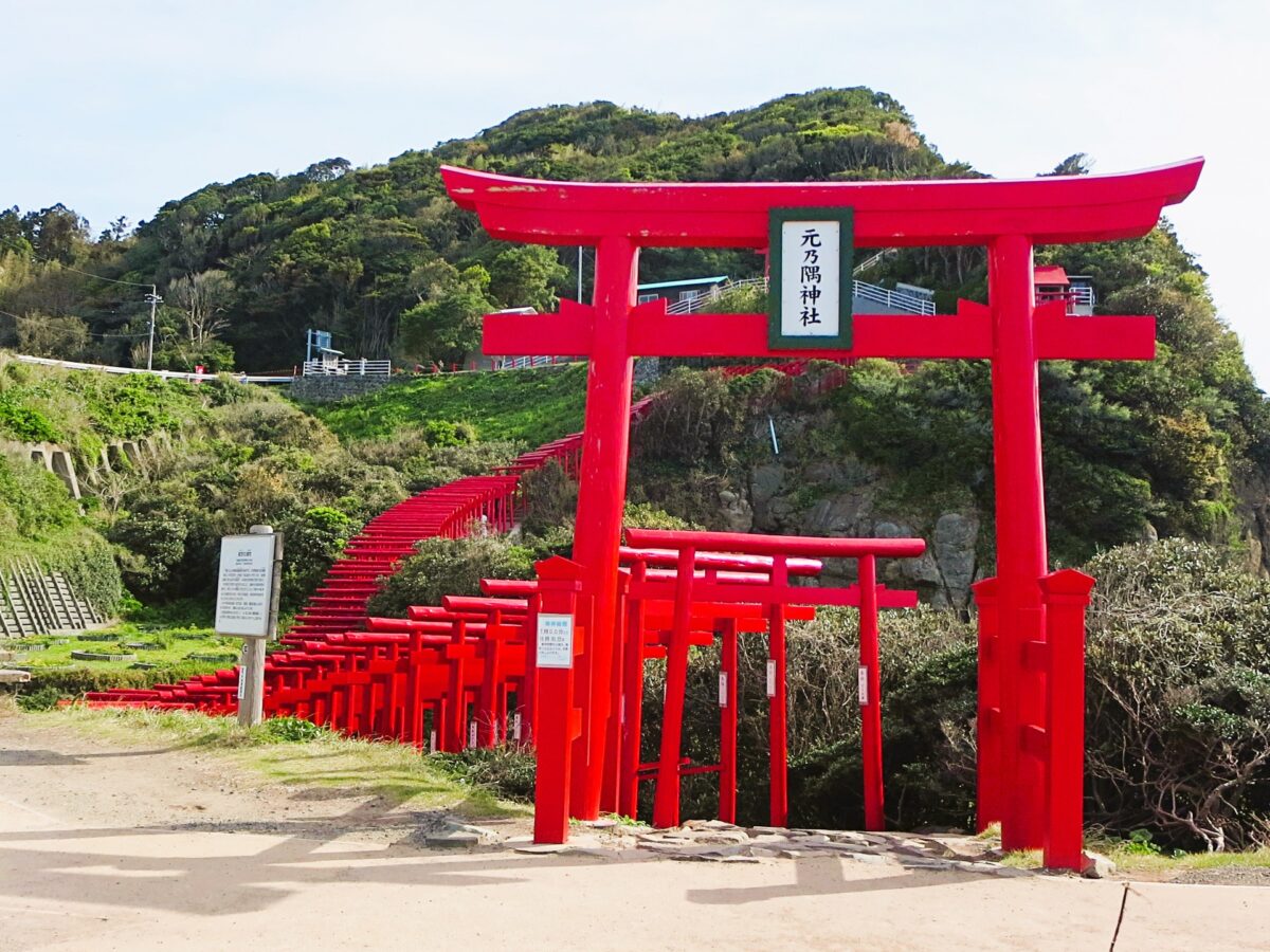 Motonosumi Shrine torii gates along the coast in Yamaguchi Japan, scenic ocean view
