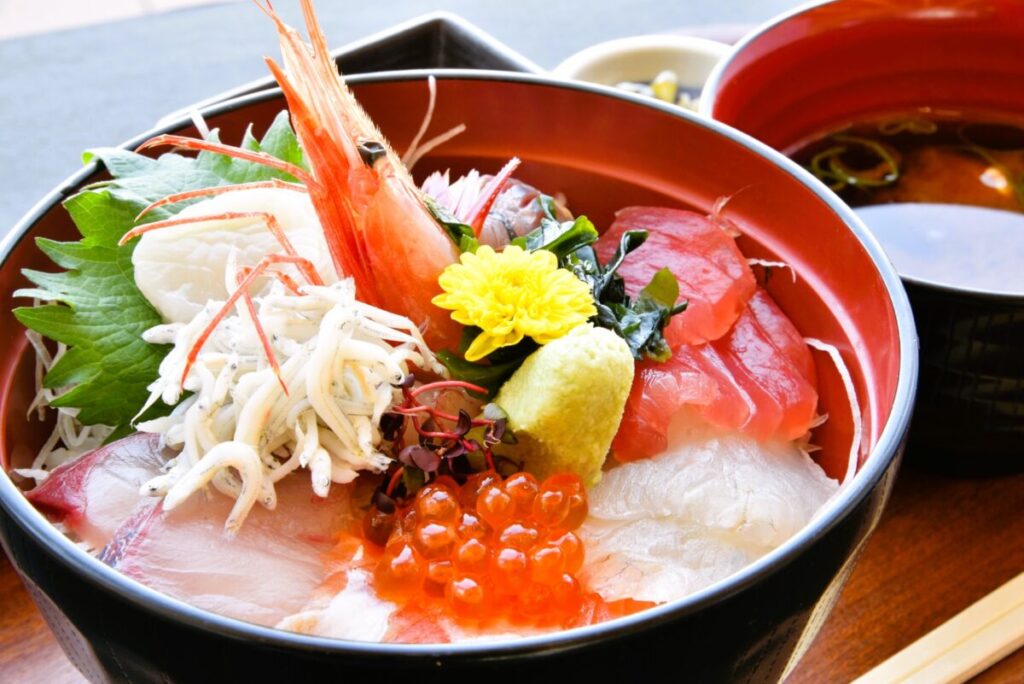Kaisendon seafood rice bowl in Japan, fresh sashimi over rice